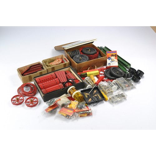 556 - Assorted Meccano parts and components including some original earlier issues as shown.