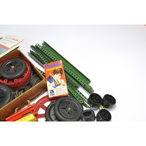 556 - Assorted Meccano parts and components including some original earlier issues as shown.