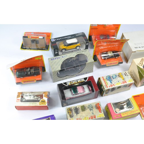 561 - A group of 21 Die-Cast vehicles from various makers, generally very good to excellent, with boxes. s... 