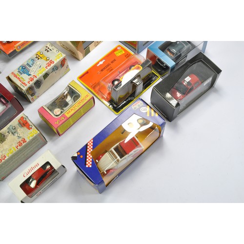 561 - A group of 21 Die-Cast vehicles from various makers, generally very good to excellent, with boxes. s... 