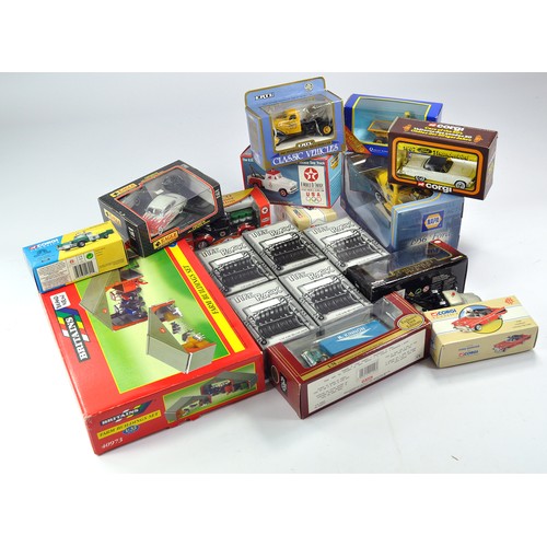 569 - An assortment of various diecast including Corgi, Ertl and others, mostly being boxed. Mostly also o... 