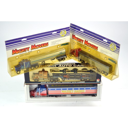 571 - A group of four diecast (American Themed) truck sets from Spec Cast, Shinsei and Ertl. Look to be ex... 