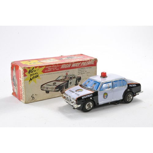 550 - Taiyo Battery Operated Tinplate Mystery Bump n Go High Way Patrol Car. Very good to excellent in wor... 