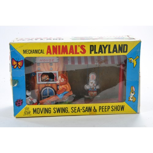 546 - TPS Japanese Mechanical Playland featuring moving swing, see-saw and peep show. Looks to be excellen... 