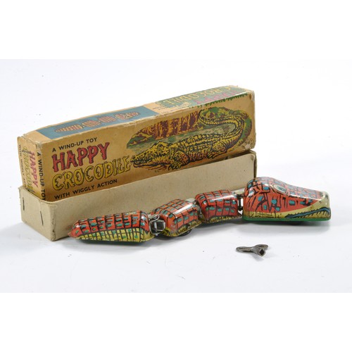 545 - Yone Japanese 'Happy Crocodile' with key. Good in fair original box.