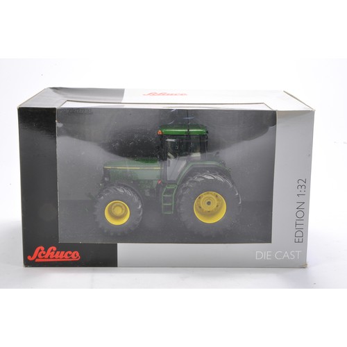 138 - Farm model interest comprising Schuco 1/32 John Deere 7810 Tractor. Looks to be excellent and withou... 