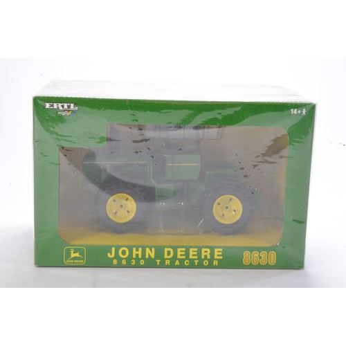 141 - Farm model interest comprising Ertl Britains 1/32 John Deere 8630 Tractor. Looks to be excellent and... 