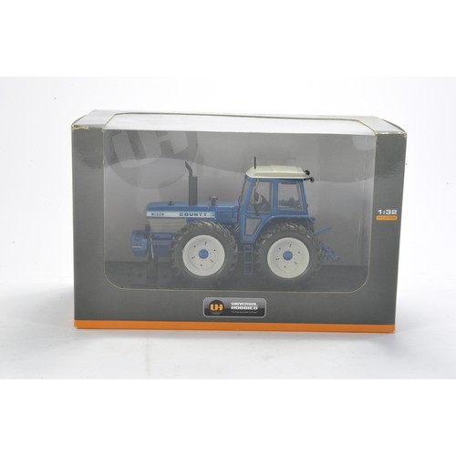 146 - Farm model interest comprising Universal Hobbies 1/32 County 1474 Tractor. Looks to be excellent and... 