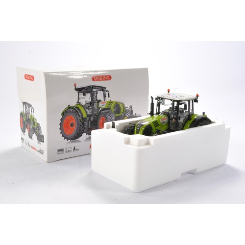 152 - Farm model interest comprising Wiking 1/32 Claas Arion 640 Tractor. Looks to be excellent and withou... 