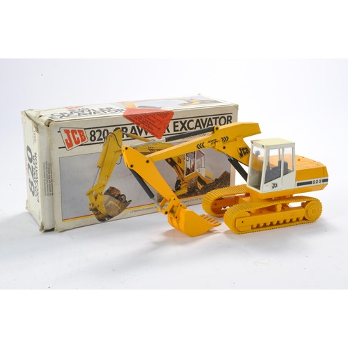 203 - Diecast model construction issue comprising NZG for J C Bamford Excavators Ltd 1/35 JCB 820 Crawler ... 