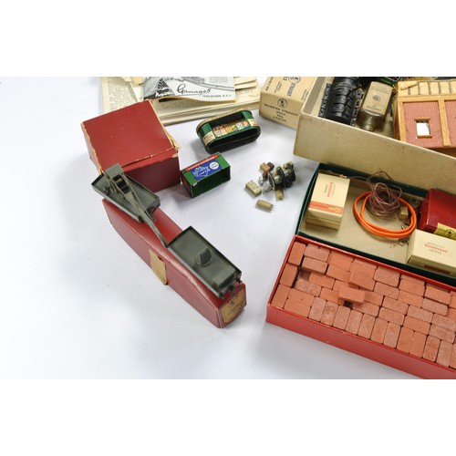 273 - A further assortment of vintage Trix Model Railway accessories and literature as shown. Plus other i... 