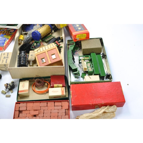 273 - A further assortment of vintage Trix Model Railway accessories and literature as shown. Plus other i... 