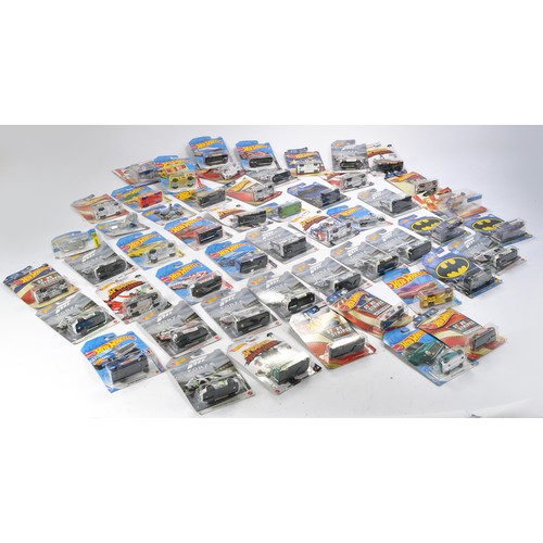 587 - A group of approx 52 Carded Hot Wheels Diecast issues, all look to be as new and factory sealed. Ser... 