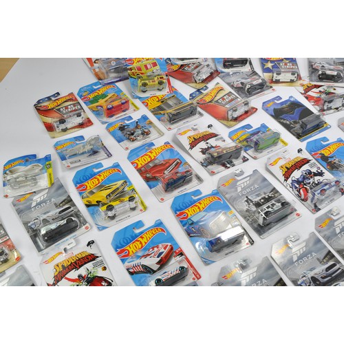 587 - A group of approx 52 Carded Hot Wheels Diecast issues, all look to be as new and factory sealed. Ser... 