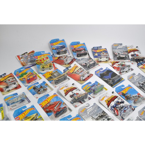 587 - A group of approx 52 Carded Hot Wheels Diecast issues, all look to be as new and factory sealed. Ser... 