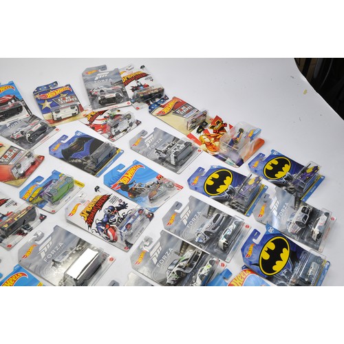 587 - A group of approx 52 Carded Hot Wheels Diecast issues, all look to be as new and factory sealed. Ser... 