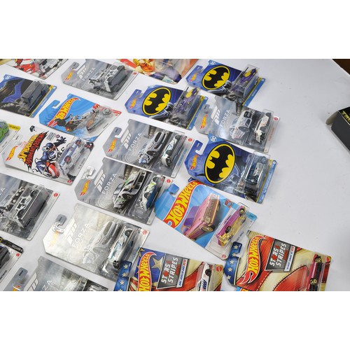 587 - A group of approx 52 Carded Hot Wheels Diecast issues, all look to be as new and factory sealed. Ser... 