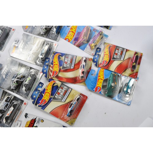 587 - A group of approx 52 Carded Hot Wheels Diecast issues, all look to be as new and factory sealed. Ser... 