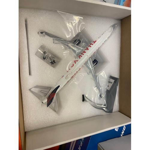 306 - Diecast model aircraft comprising the following issues. 1) Airbus 1/200 A321neo in the livery of Cat... 