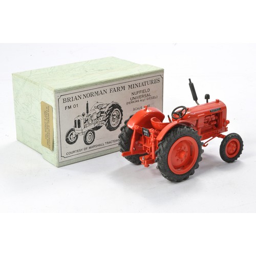 51 - Brian Norman 1/32 Hand Built farm issue comprising no. FM01 Nuffield Universal Tractor. Some axle di... 