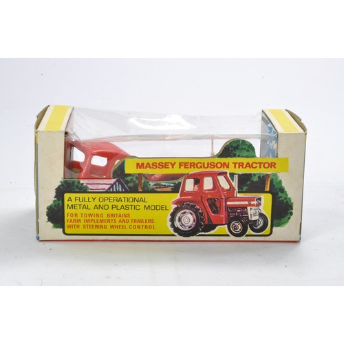 83 - Britains Farm 1/32 issue comprising No. 9529 Massey Ferguson 135 Tractor. Unused example is complete... 