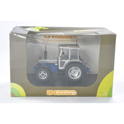 101 - Universal Hobbies 1/32 Ford 7810 Silver Jubilee Tractor. Appears excellent, secured in box with no o... 