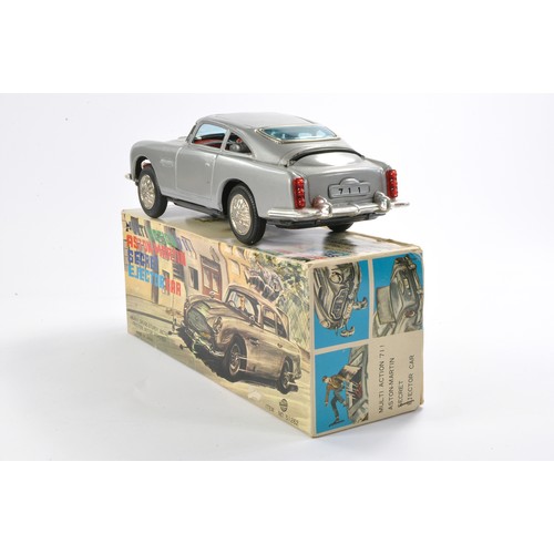 413 - United Large Unlicensed Japanese Friction Driven Tinplate James Bond 007 Aston Martin DB5 complete w... 