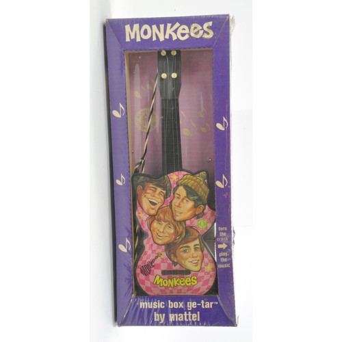 419 - Mattel 1966 Official Monkees Music Box 'Ge-Tar' with turning crank handle to 'test' operate the toy ... 