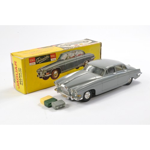 448 - Telsalda Friction Driven No. 20720 Jaguar Mark 10 Saloon Car with Luggage. Complete and in good work... 