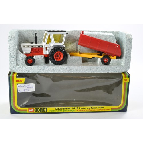 479 - Corgi No. 34 David Brown 1412 Tractor with Tipper trailer. Yellow Tinted Windows. Excellent with no ... 