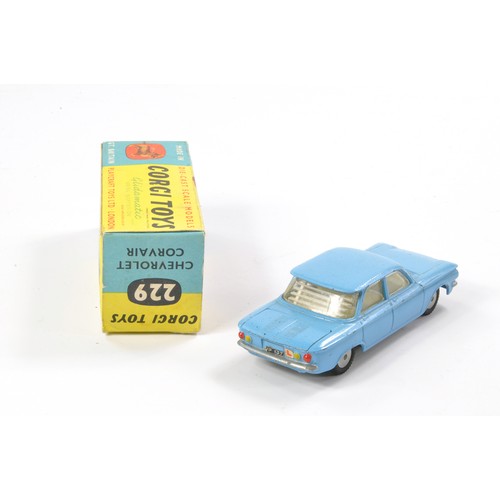 489 - Corgi No. 229 Chevrolet Corvair. Blue with white interior. Very good to excellent with minor specks ... 