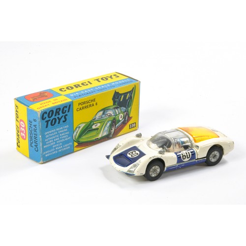 490 - Corgi No. 330 Porsche Carrera 6. Red, Blue and White. Good to very good, some more notable marks in ... 