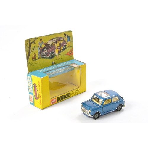 518 - Corgi No. 334 Mini Cooper Magnifique. Generally excellent, a couple of minor marks in very good to e... 