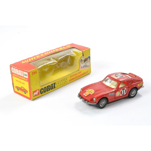 519 - Corgi No. 394 Datsun 240Z. Red with white interior. Generally excellent, the odd speck in very good ... 