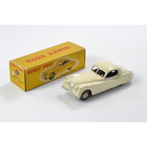 537 - Dinky No. 157 Jaguar XJ120 Coupe. Off White. Fawn Hubs. Generally very good with a few specks and ma... 