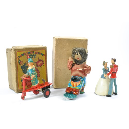 610 - Mechanical / Tinplate issues comprising Clown Riding Toy, Japanese Fishing Bear plus Cinderalla danc... 