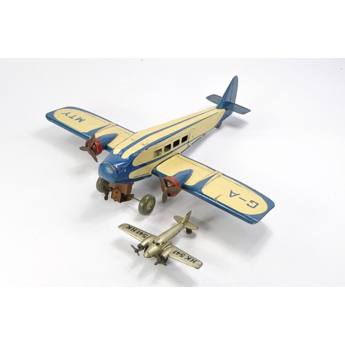 613 - Mettoy 1930's Tinplate Mechanical Plane plus Post War Hammerer & K�hlwein Prop Plane. Both with sign... 