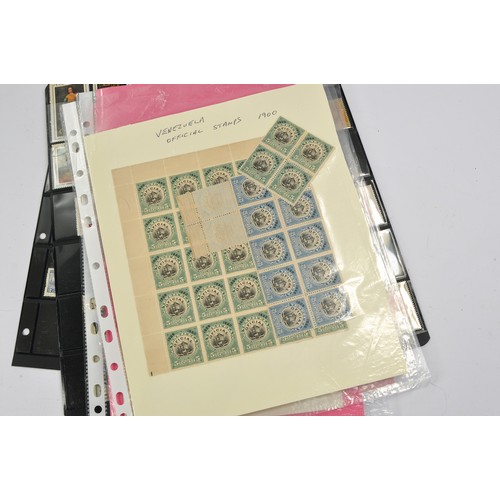 218 - Stamps interest comprising a collection of South American issues contained mostly on loose sheets as... 