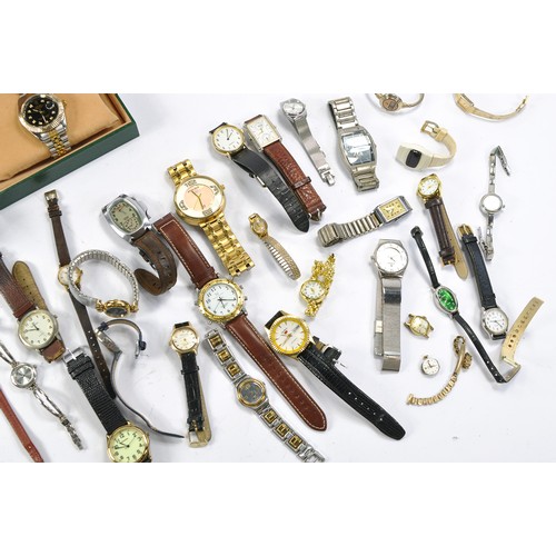 657 - A group of used wrist watches including Rolex Replica issue with case and many others. All untested.