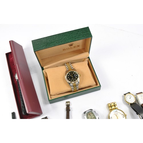 657 - A group of used wrist watches including Rolex Replica issue with case and many others. All untested.