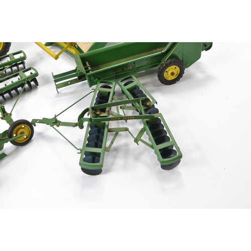 259 - An interesting assortment of ESKA (Pre-Ertl) John Deere Vintage Tractor and Implement issues includi... 