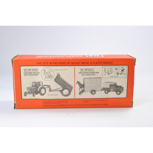 262 - Britains 1/32 No. 9630 Ford 6600 Tractor and Shawnee Poole Dump Trailer. Generally excellent with li... 