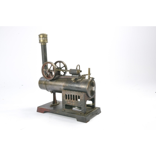 19B - An old horizontal stationary steam engine, German maker, Doll et Cie. In well used condition and lik... 