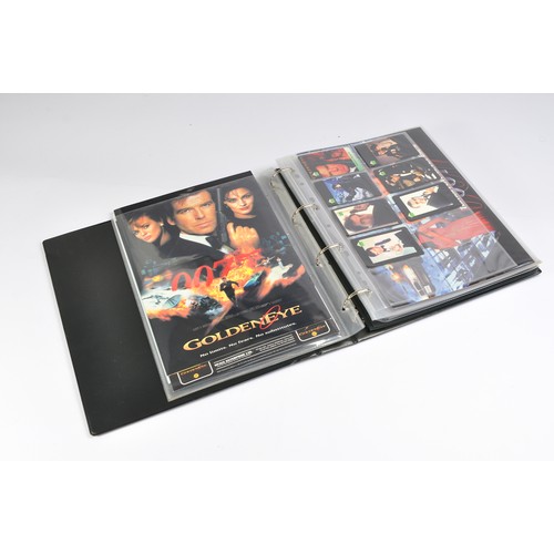 252 - Phone Cards, to include a folder of various promotional cards from James Bond 007, Baywatch etc. Uns... 