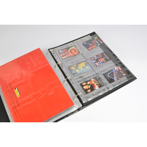 252 - Phone Cards, to include a folder of various promotional cards from James Bond 007, Baywatch etc. Uns... 