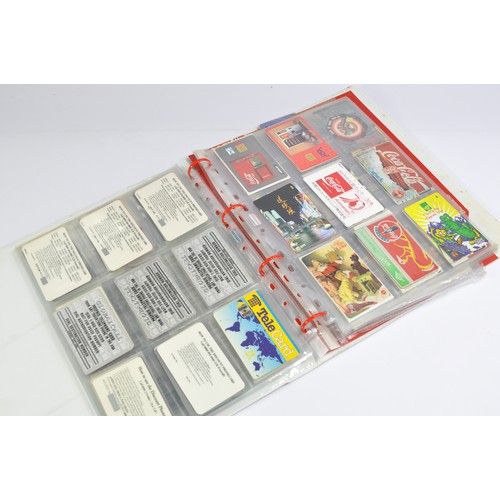 256 - Phone Cards, to include an album of Worldwide Coca Cola cards inclusive of Japan, America etc.