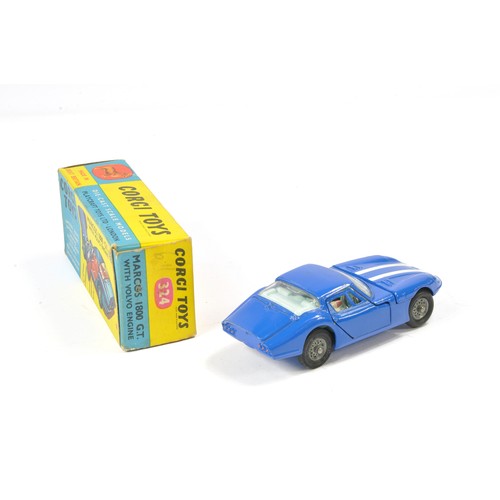 Corgi No. 324 Marcos 1800 GT with Volvo Engine. Blue / White with white  interior. Generally very goo