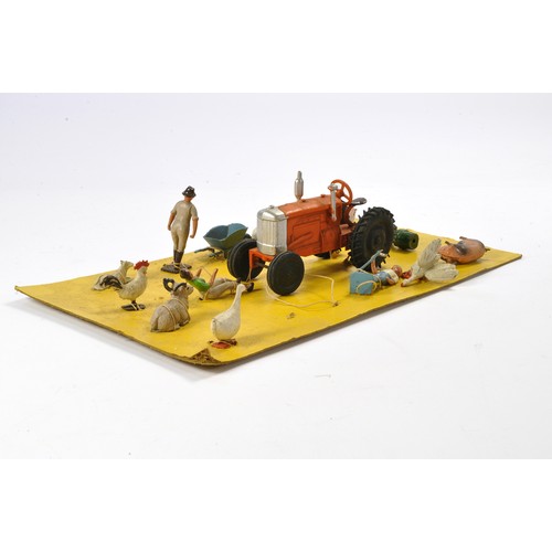 102 - Crescent No. 2703 Tractor and Farm Set comprising Tractor in orange with rubber wheels, silver trim ... 