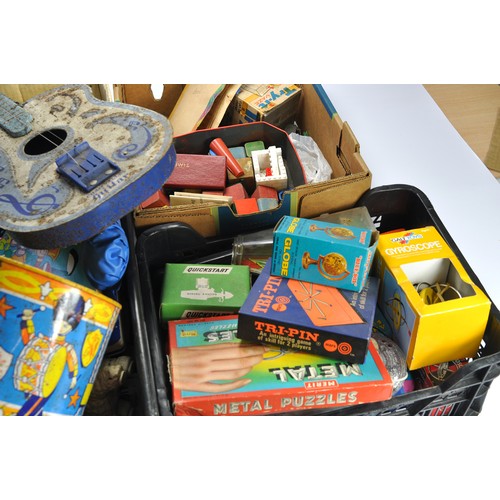 159 - A large quantity of playworn vintage toys, components and similar contained within boxes as shown.