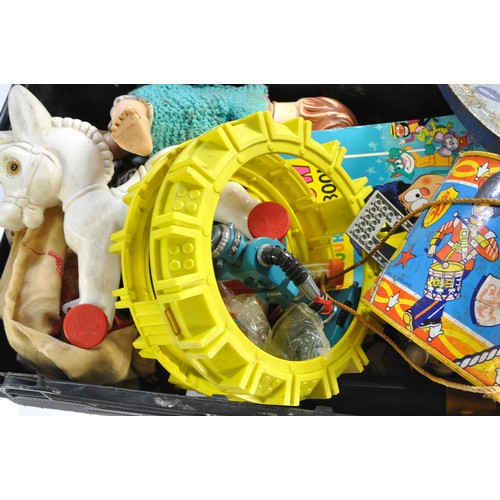 159 - A large quantity of playworn vintage toys, components and similar contained within boxes as shown.